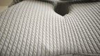 Close-up of the Butterfly Knee Pillow's ribbed-knit cover fabric