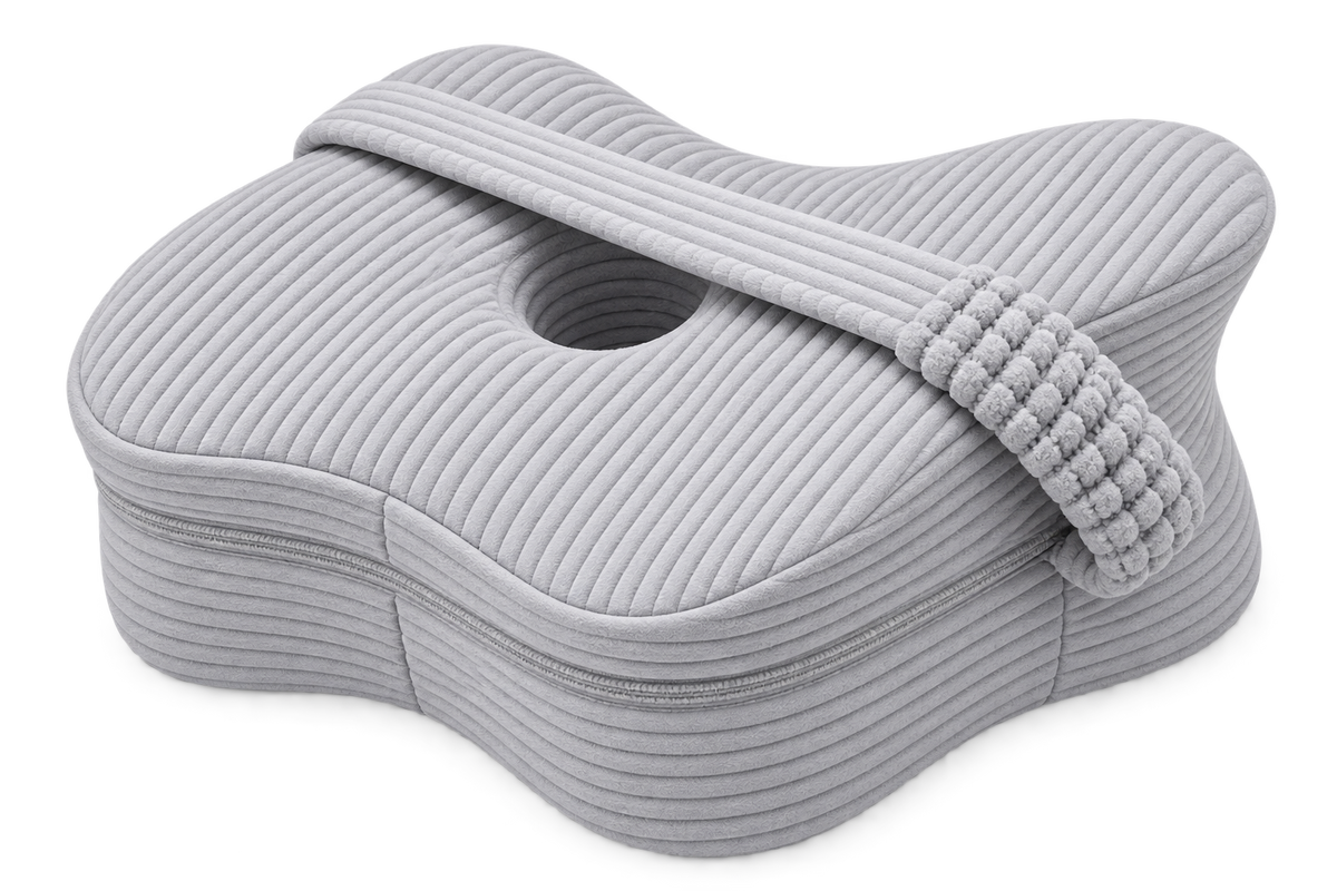 Aveland Butterfly Knee Pillow in heather grey ribbed knit — contoured side-sleeper shape with elastic retention strap, shown on a clean background