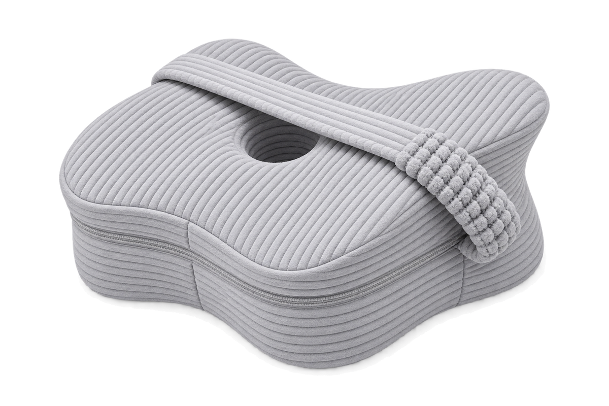 Aveland Butterfly Knee Pillow in heather grey ribbed knit — contoured side-sleeper shape with elastic retention strap, on a clean background