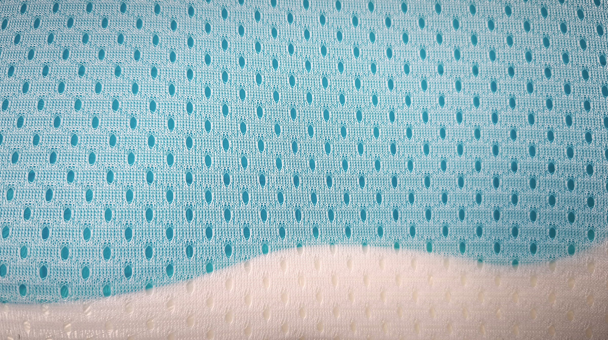 Close-up of the open-hole mesh top over the cooling gel layer