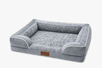 Aveland Bolster Dog Bed in grey — three-sided bolster sofa style with a plush sleeping surface, white piping and a low open front